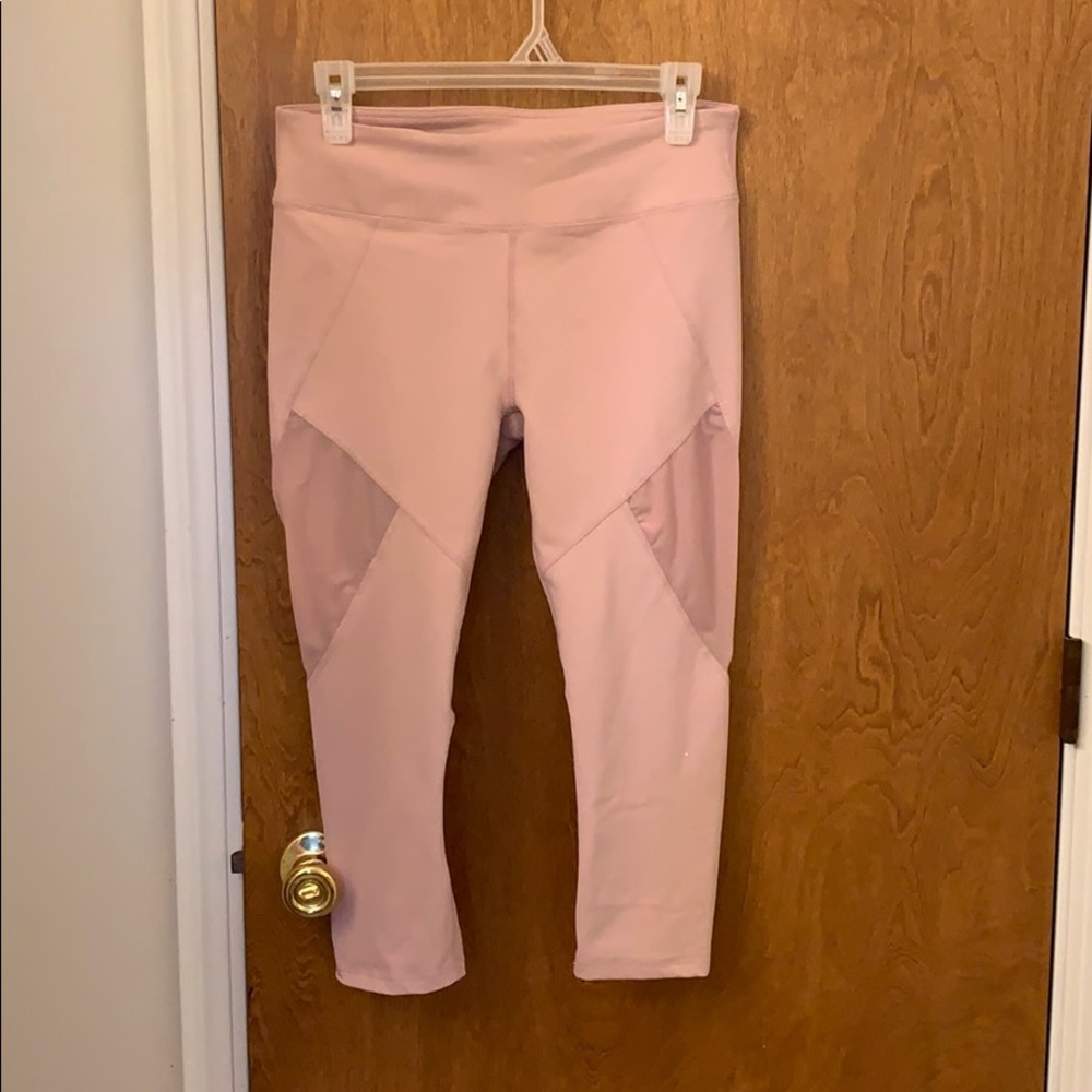 Fabletics pink Capri leggings with mesh cutouts